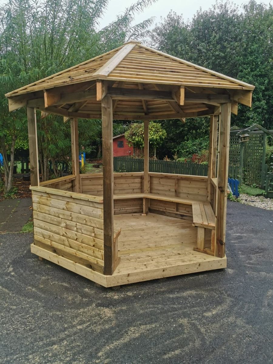 Wooden 3m x 3m gazebo, complete with hipped roof and seats